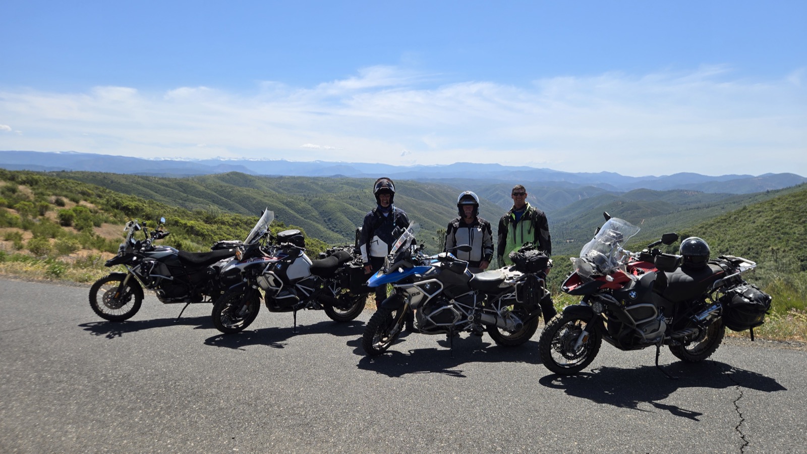 Group ride with mountain backdrop